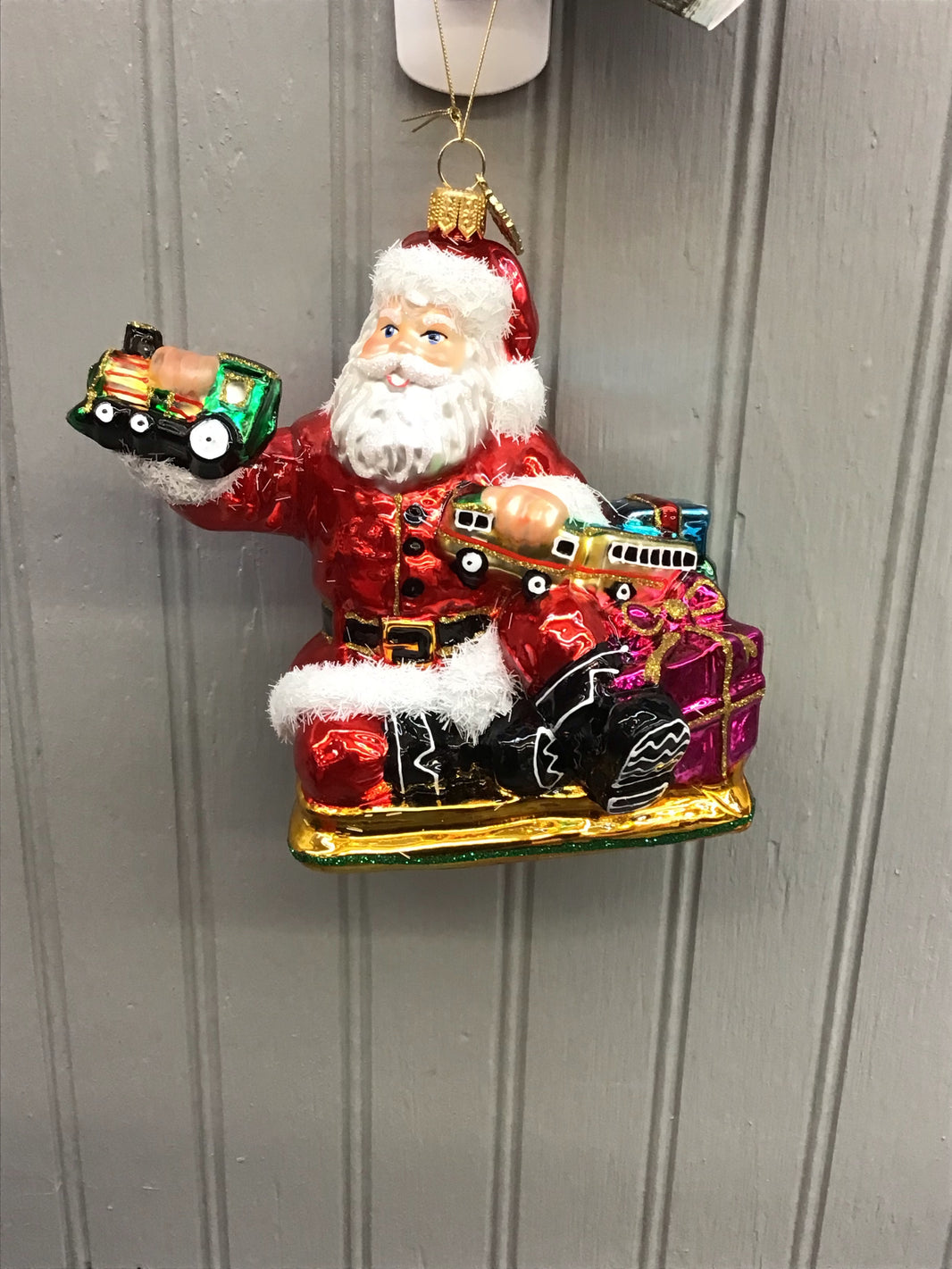 Huras Family Santa with Toy Train Ornament