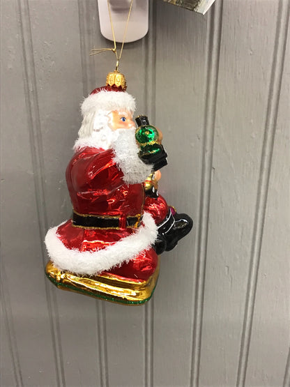 Huras Family Santa with Toy Train Ornament
